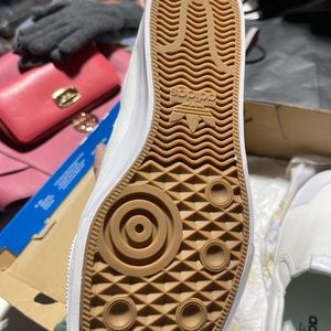 Men’s size 10 slip on. Never worn .